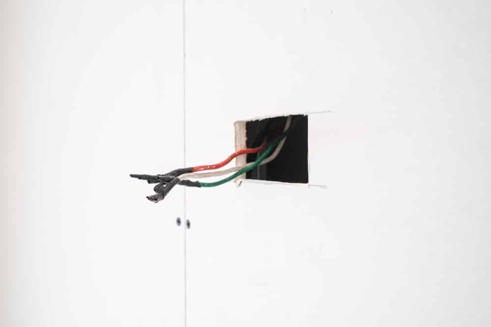 Licensed Hot Shot Electric professionals repairing hazardous aluminum wiring – certified Tulsa experts safely upgrade connections to prevent fire risks.