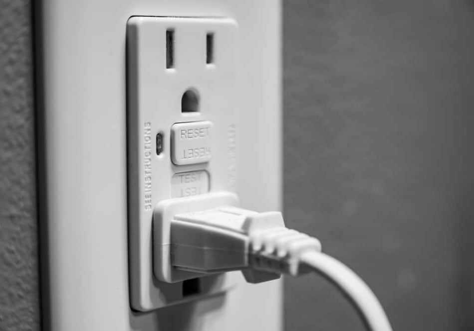 Professional Hot Shot Electric certified electrician installs GFCI outlet for outdoor safety – licensed Tulsa experts add protected receptacles for landscape lighting, patios, and pools in Oklahoma homes.